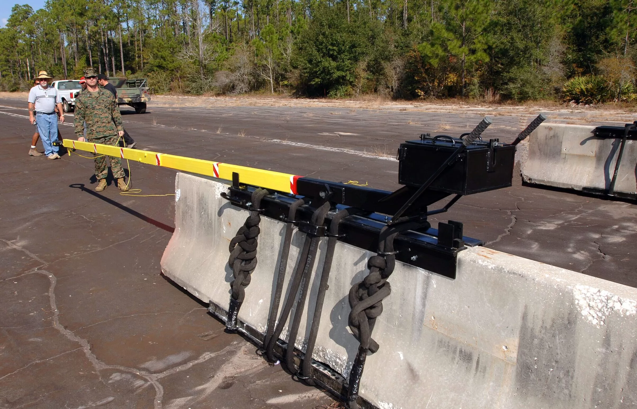 Image showing Hellfire Swing deployable solution mounted to local concrete barrier.