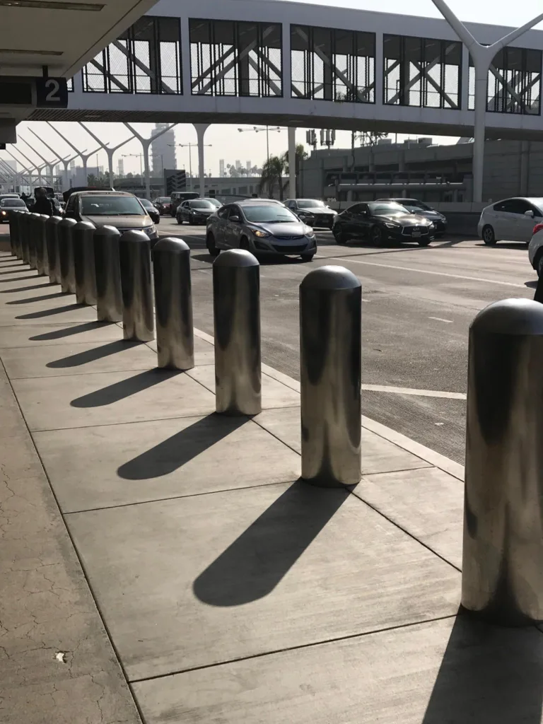 Barrier1 Tomahawk bollards lining a sidewalk. Thank you for contacting Barrier1.