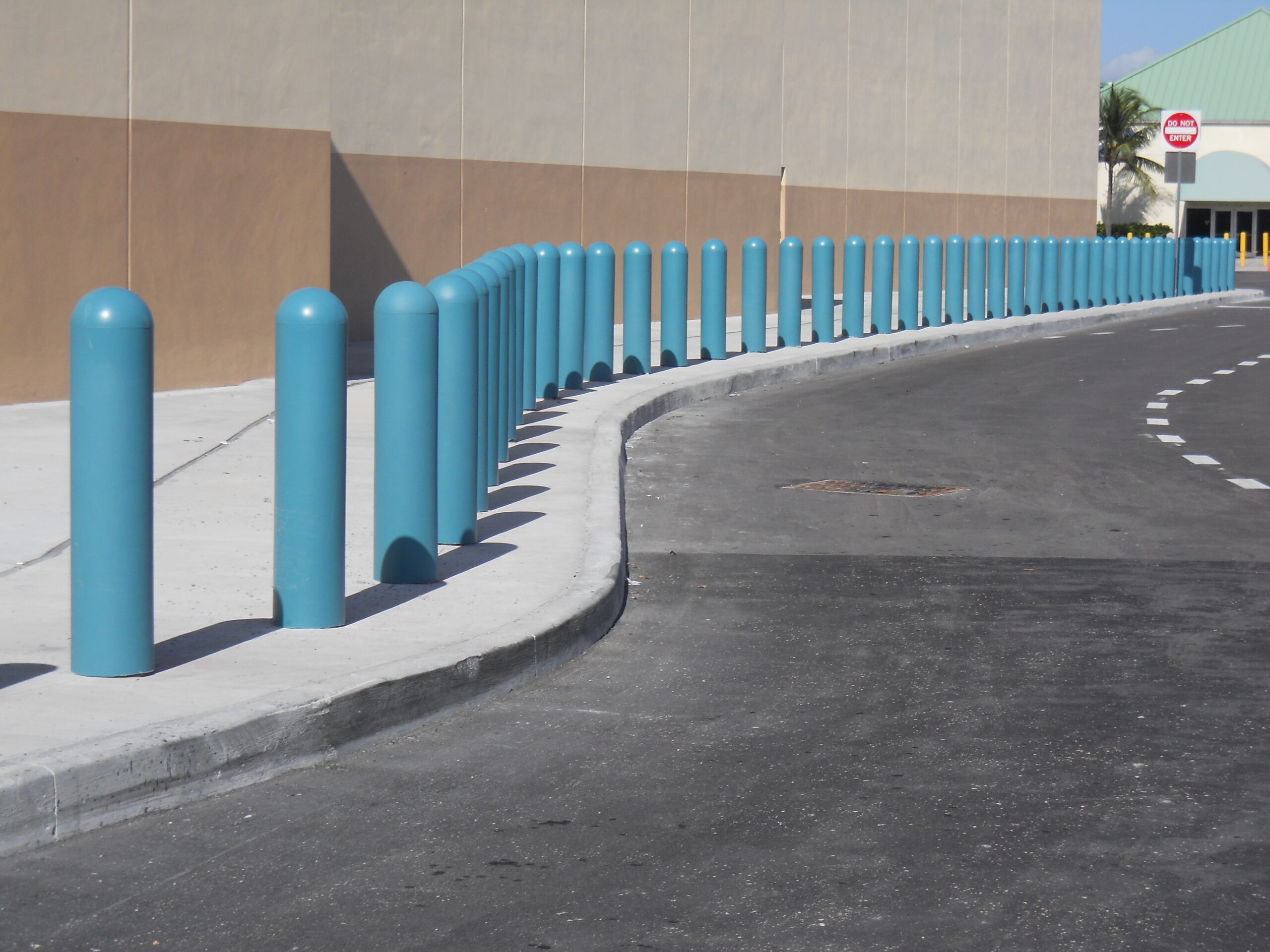 Image of Hercules bollards installed with blue covers