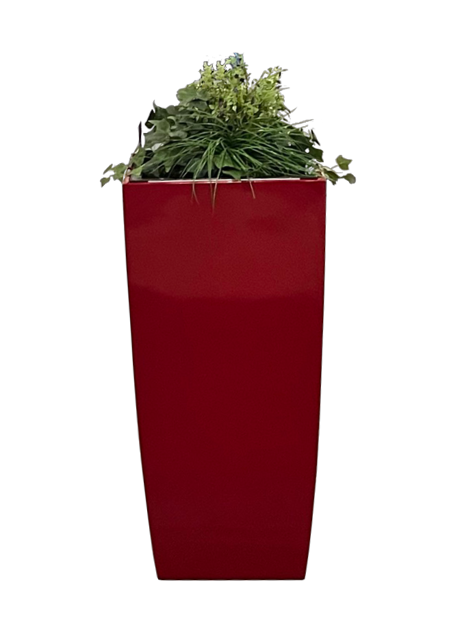 Tall red bollard cover planter with green plants.